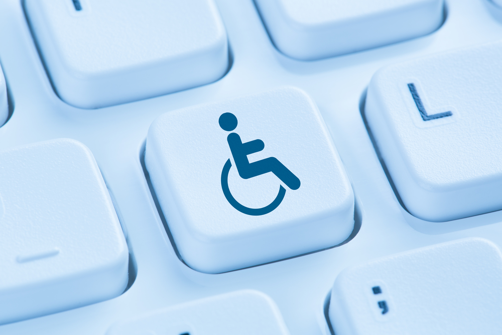 photo of wheelchair symbol on computer keyboard